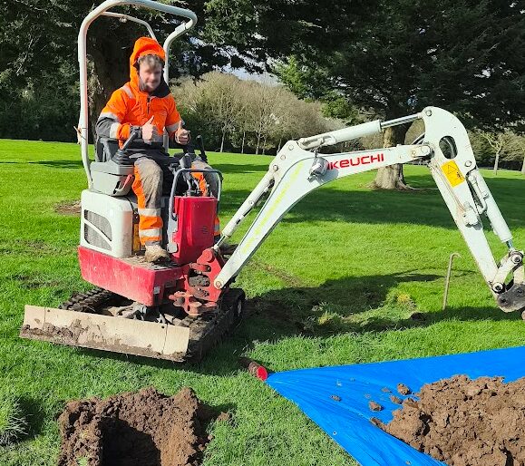 Trial pit dug to locate a drain and examine soil conditions
